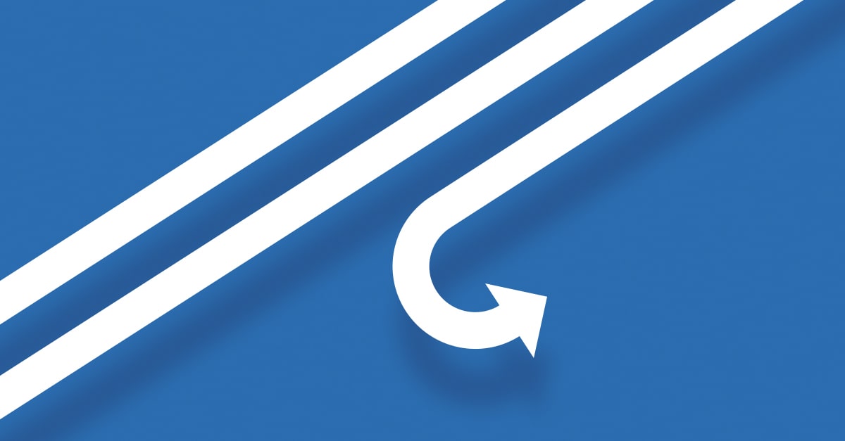 A long white arrow on blue background.