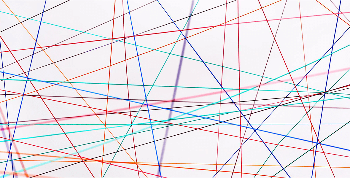 Colorful, intersecting lines representing the interconnectivity of the physical internet.