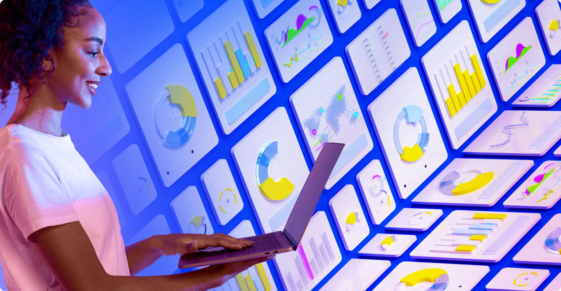 Person holding a laptop in front of a bright background of marketing data and multimedia images.