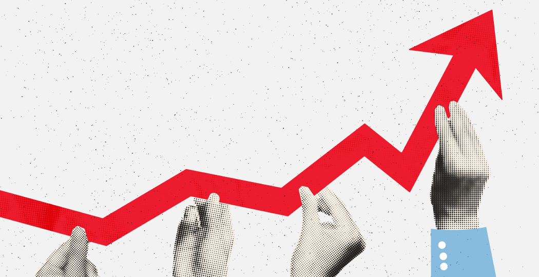 Hands pushing the arrow of a growth chart upward